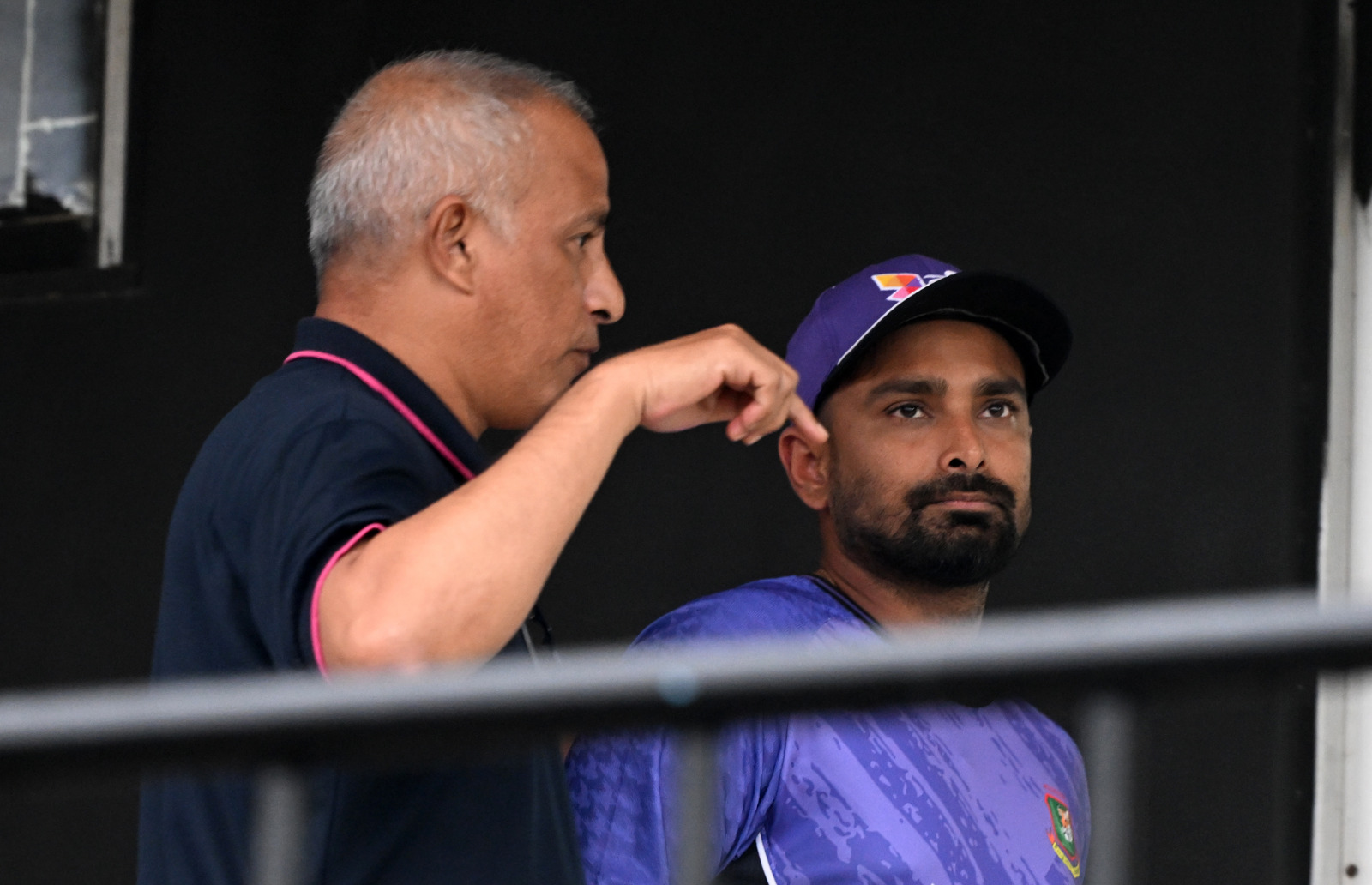 Umpire Mukul with captain Litton Das©BDCricTime