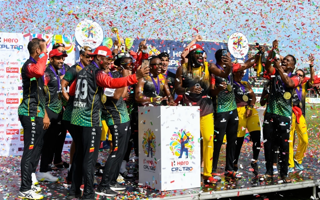 Dwayne Bravo and Chris Gayle celebrate St Kitts and Nevis Patriots' CPL 2021 title, © CPL , CPL T20 2021