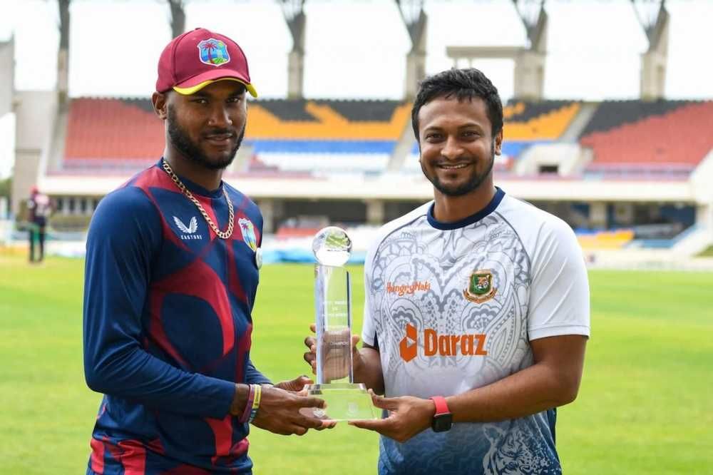 Kraigg Brathwaite and Shakib Al Hasan pose with the Test series trophy