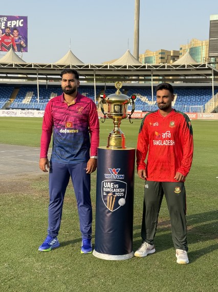 Bangladesh captain Litton Das and UAE captain Muhammad Waseem pose with the trophy before the T20I series