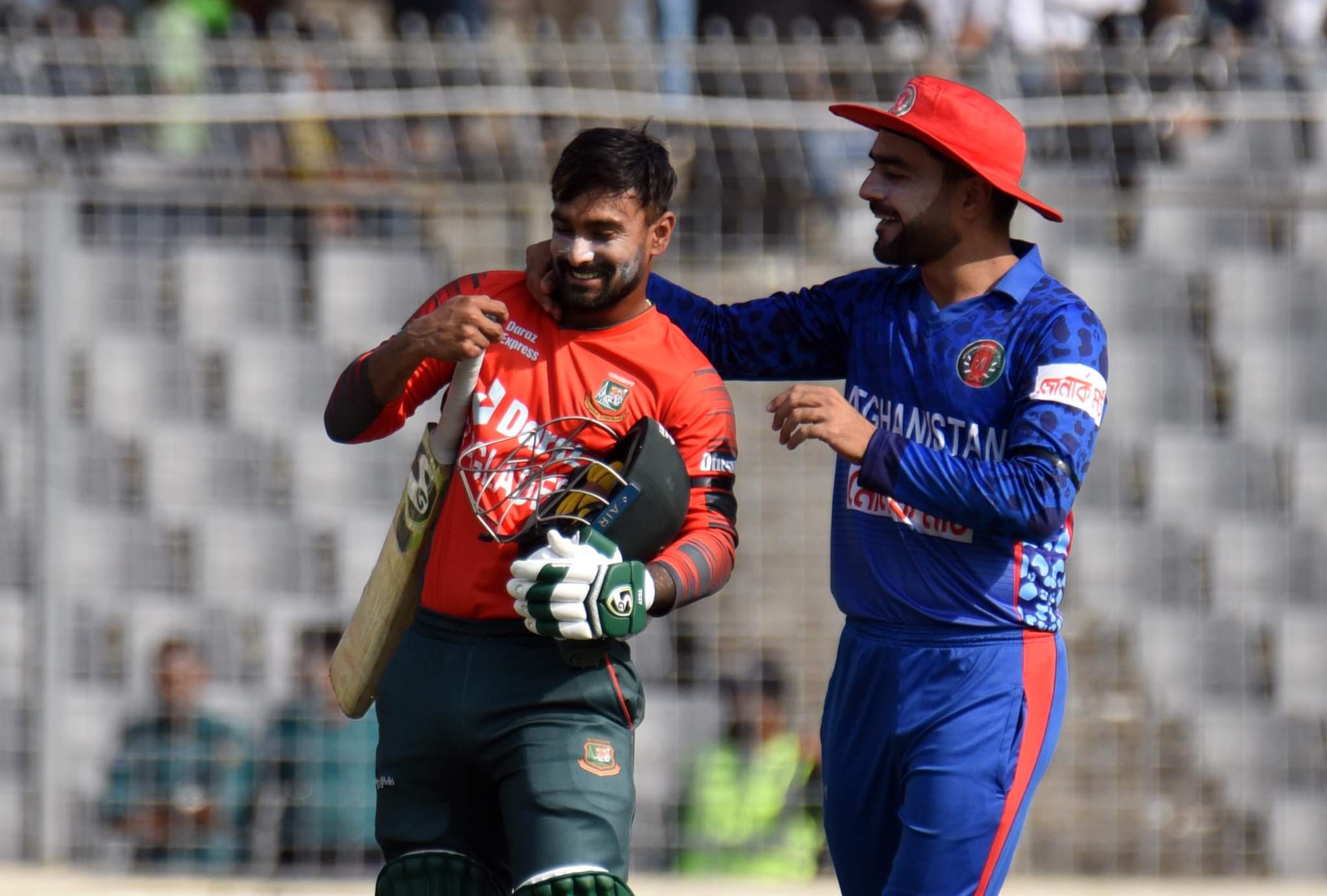 Rashid Khan has a light moment with Liton Das   
