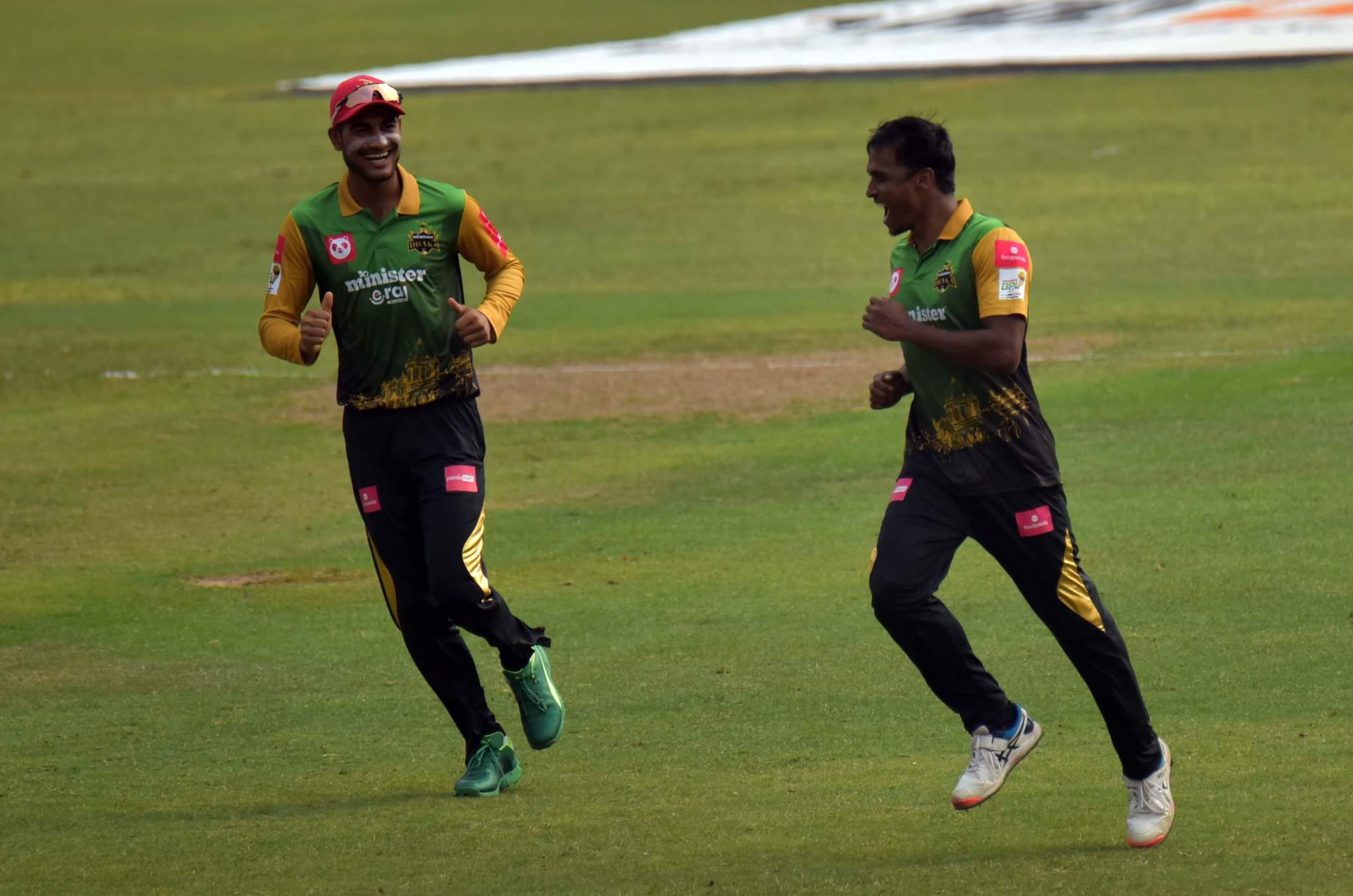 Rubel Hossain celebrates a wicket with Naim Sheikh  