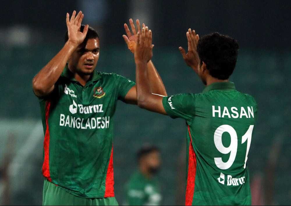 Taskin Ahmed celebrates with Hasan Mahmud after a dismissal